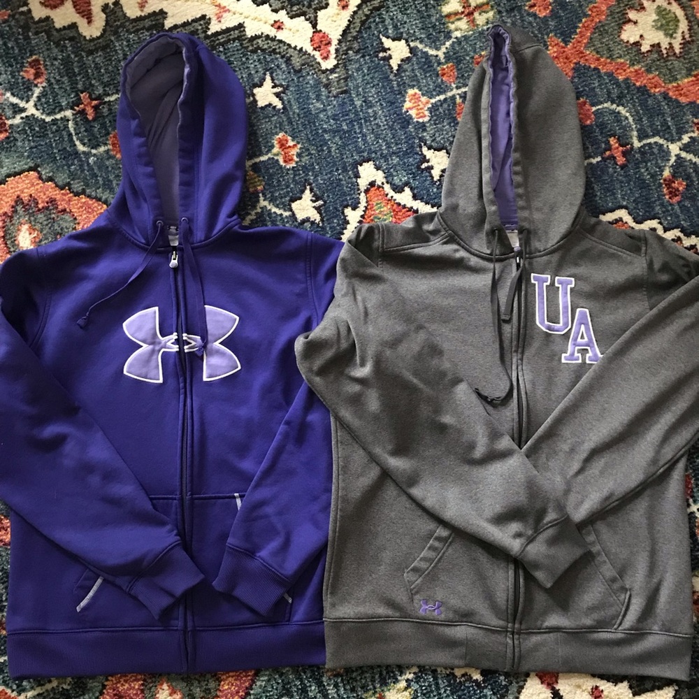 Two ladies Under Armor zip ups
